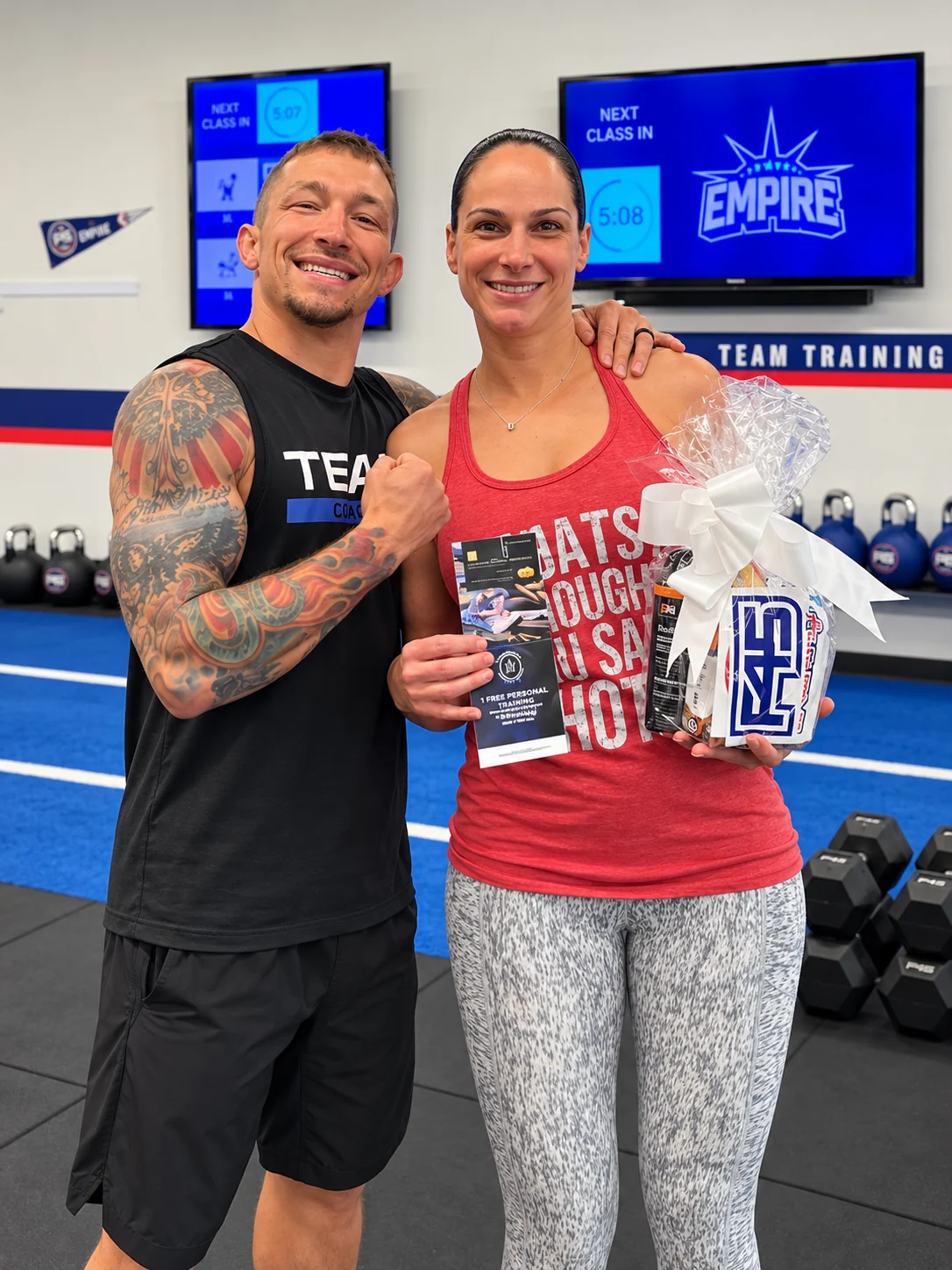 F45 Pompano member and coach celebrating at the studio