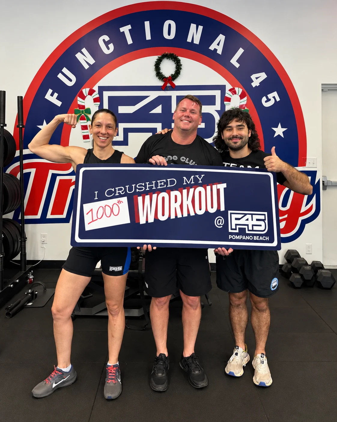 F45 Pompano members celebrating a workout milestone